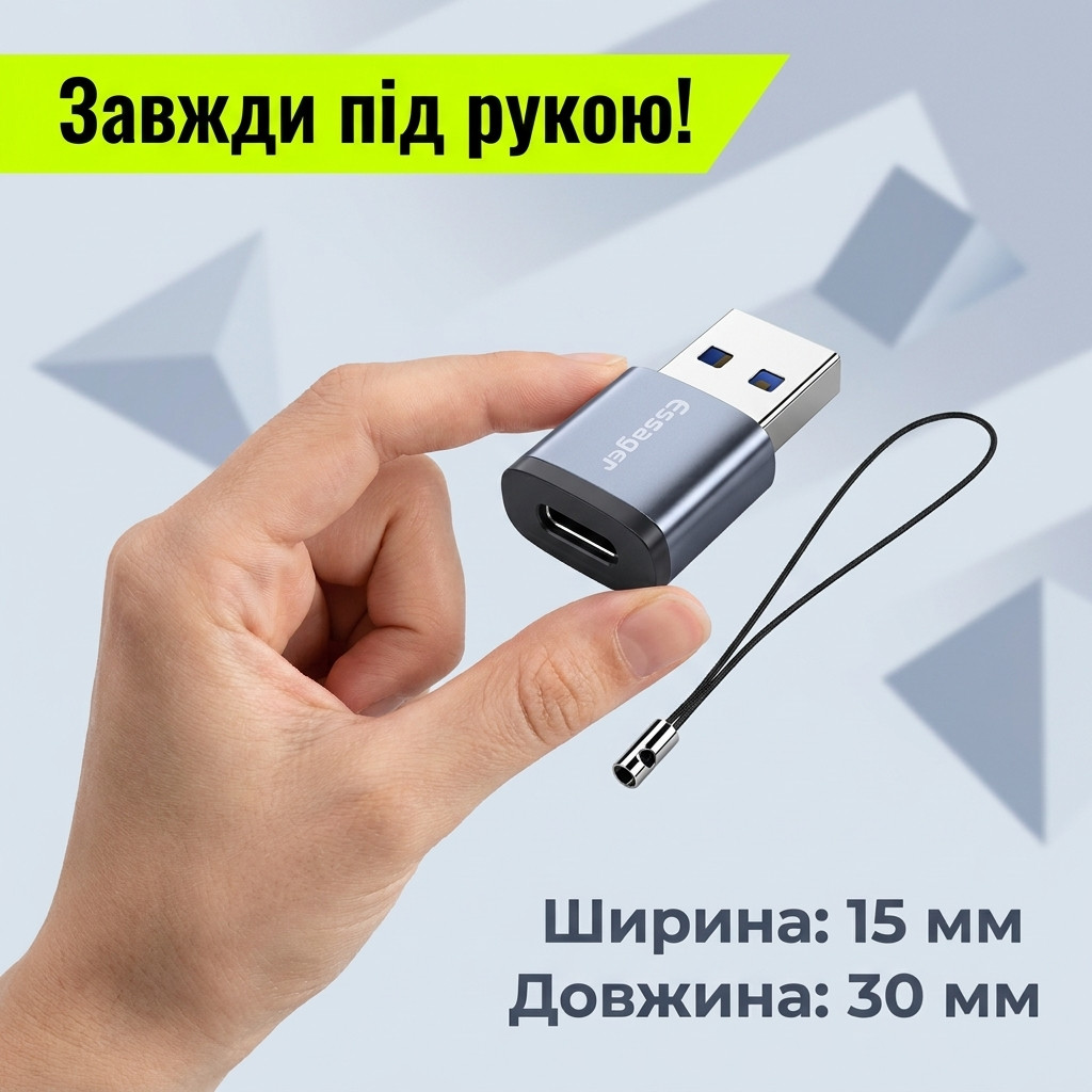 Адаптер Essager Soray OTG поруч із ноутбуком з USB Type-C